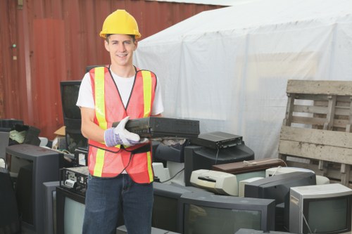 Modern waste disposal vehicles for construction debris in Ascot